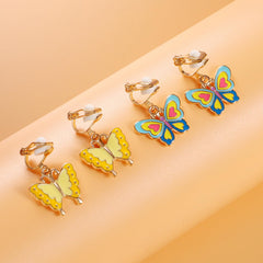 SYNLIN clip-on earrings with butterfly theme brighten outfits for versatile kids wear.