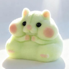 Taba handcrafted hamster face detail highlights unique craft and gentle silicone texture.