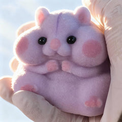 Close-up of mochi texture on Taba hamster for soothing tactile play.