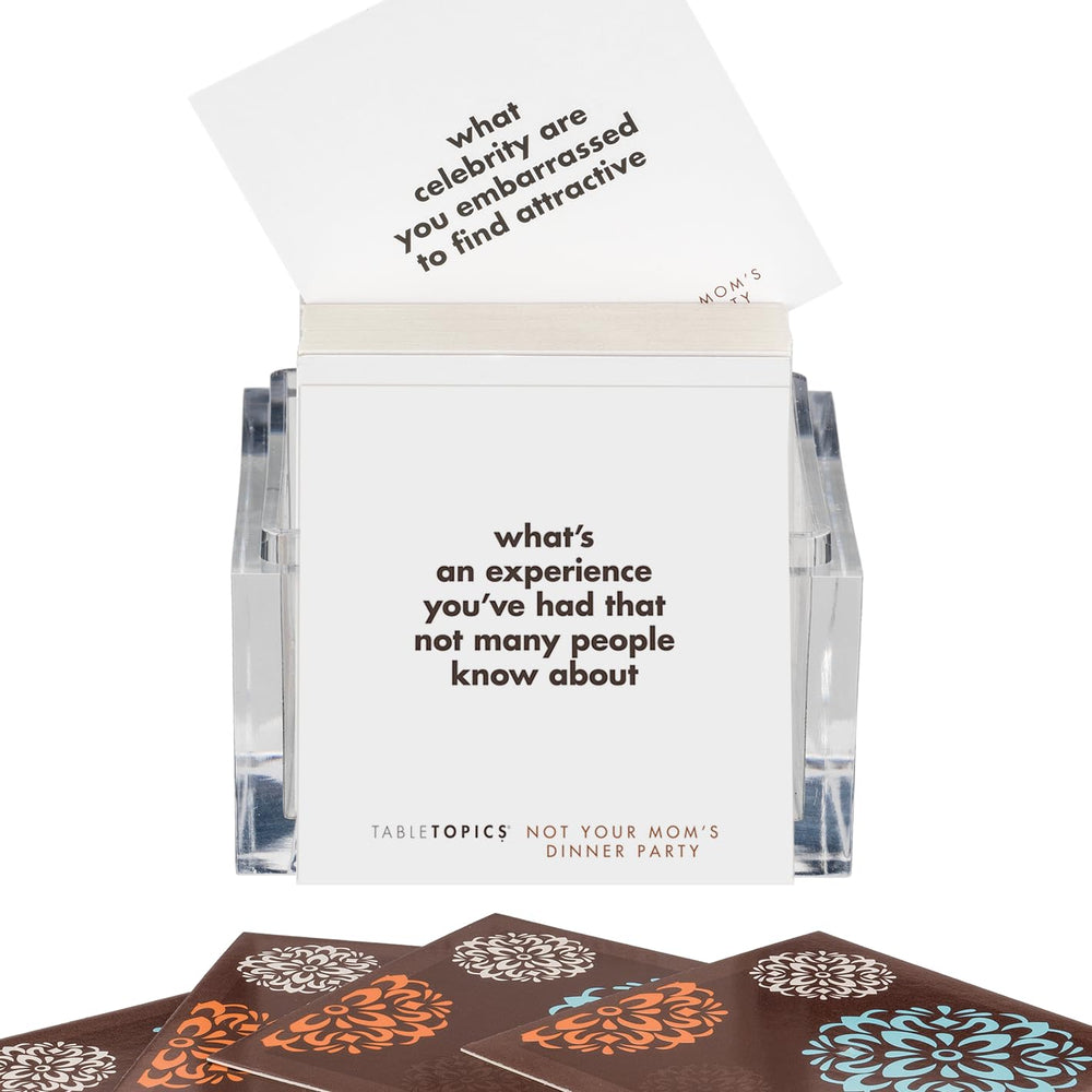 TableTopics 135-question cards close-up fueling lively talks.