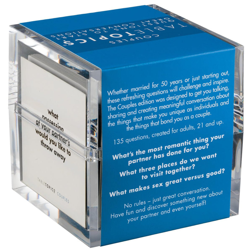 TableTopics clear cube container on a coffee table for easy card access