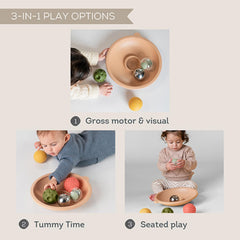 Taf Toys baby tray interaction depicts reaching and pushing to boost hand-eye coordination.