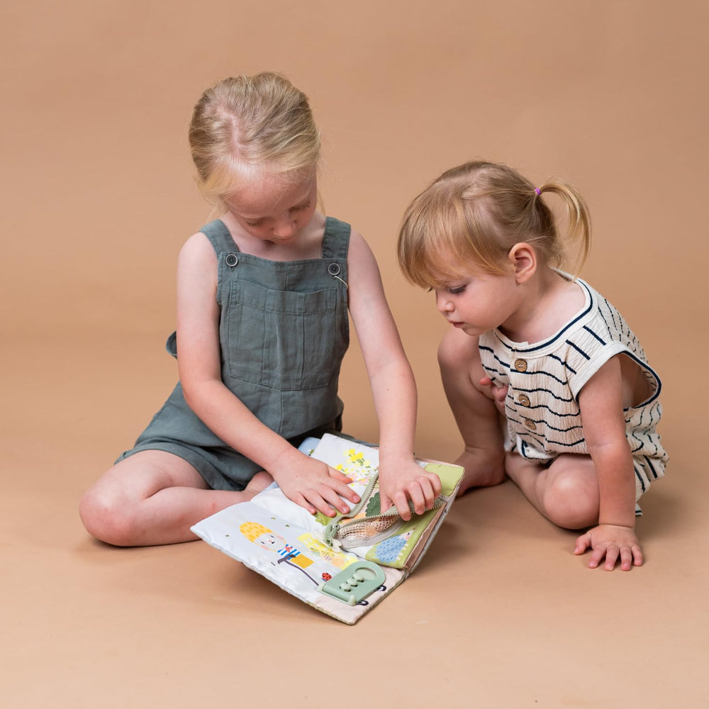 Taf Toys Busy Book toddler engagement offers quiet, screen-free moments during trips