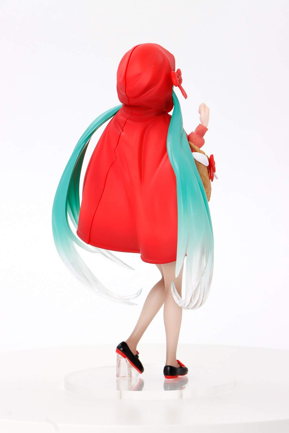 Taito Hatsune Miku Wonderland Little Red Riding Hood figure's detailed sculpt captures a playful scene.