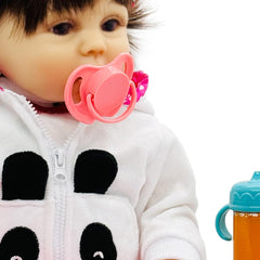 Taken All magic bottle set with dolls in a feeding play scenario for storytelling.