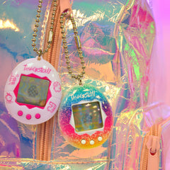 Tamagotchi Original Rainbow battery included for instant, on-the-go setup.