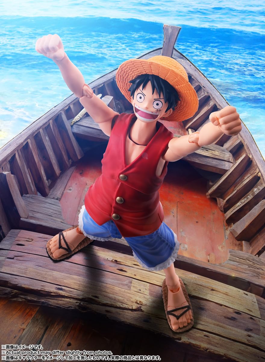 TAMASHII NATIONS Luffy Romance Dawn S.H.Figuarts interchangeable hands for expressive gestures.