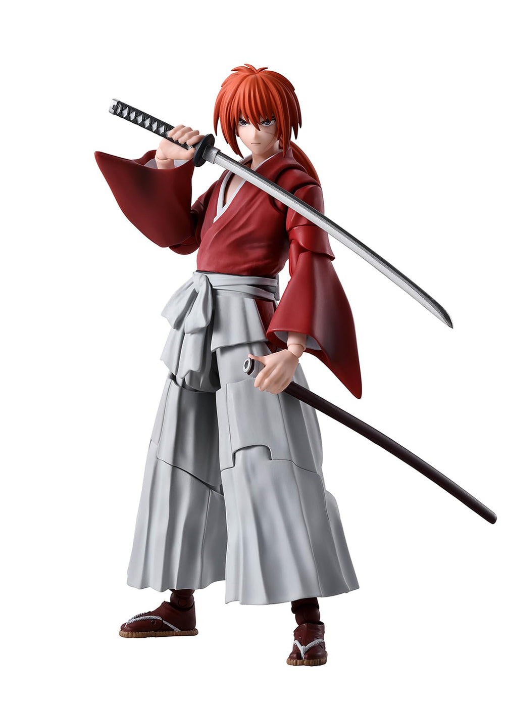 Tamashii Nations Kenshin figure with drawn reverse-blade sword for dynamic display