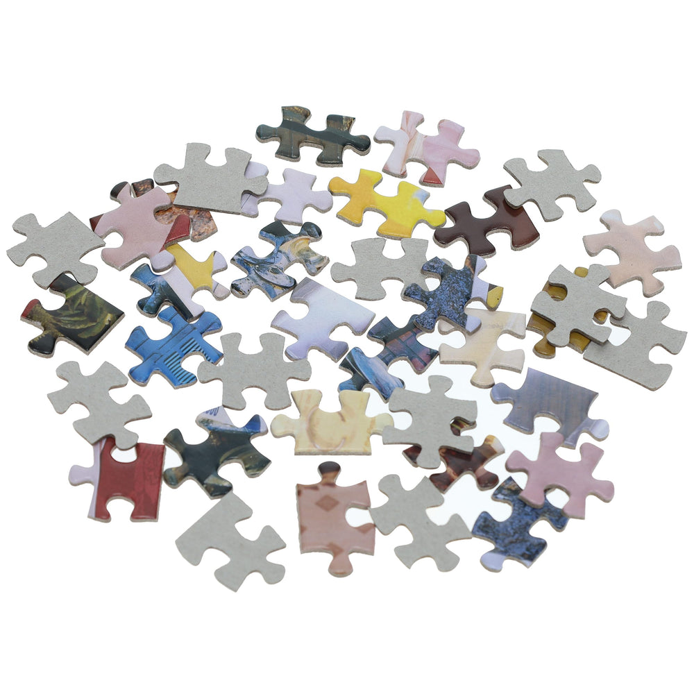 TDC Games Alphabet Mystery Puzzle ideal for adult game nights and social brain workouts.