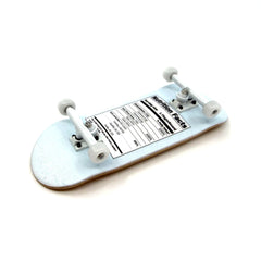 Teak Tuning Prodigy Trucks in white enhance turning stability and consistency.