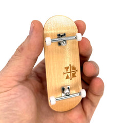 Teak Tuning Silver Heels 34mm ProDeck fully assembled for ride-ready setup.