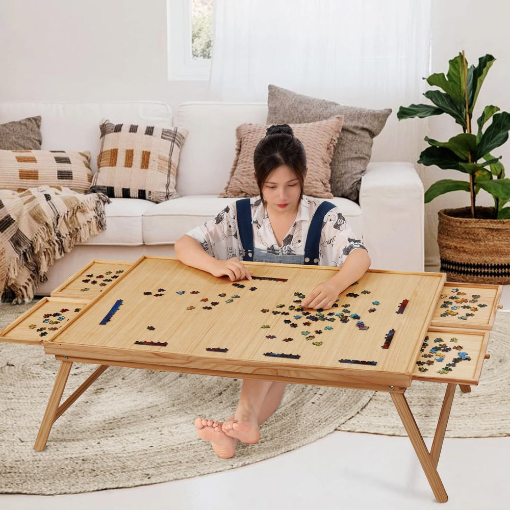 TEAKMAMA puzzle board with 4 drawers keeps pieces organized during play