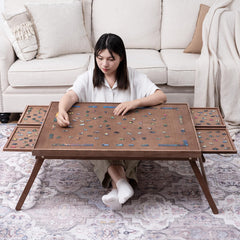 TEAKMAMA puzzle board with folding legs for comfortable seated puzzling.