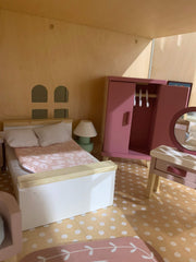 Tender Leaf Toys dovetail bedside table with lamp ideal for bedtime reading scenes.