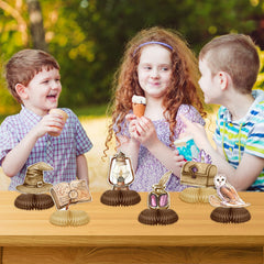 Tewess playful baby shower decor adds whimsical charm to tables.