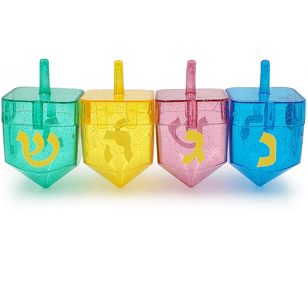 The Dreidel Company fillable dreidel used as party decoration and prizes at celebrations.