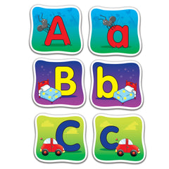 The Learning Journey card layout flat-lay displaying colorful uppercase and lowercase pairs for easy learning