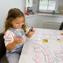The Learning Journey storage box open with cards organized for durability and simple cleanup