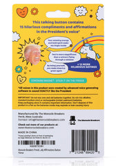 The Monocle Breakers Trump button on a shelf creates lighthearted office moments.