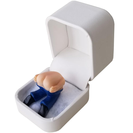 The Moon Ring prank box opens, delivering a playful fart gag for icebreakers.