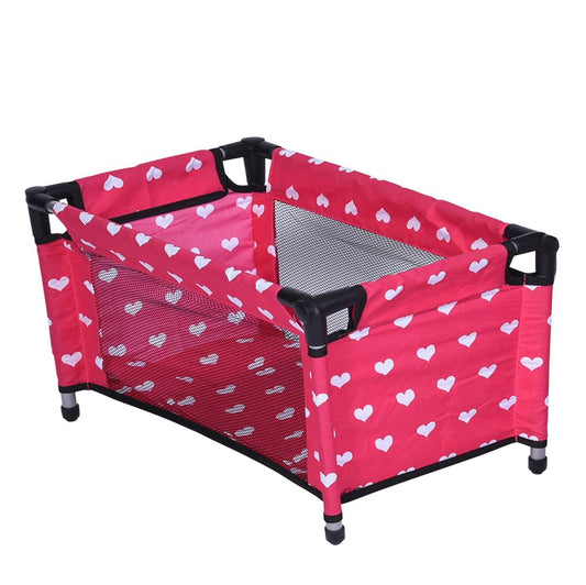 The New York Doll Collection doll Fold n' Store Pack n' Play with hearts for pretend bedtime.