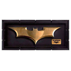The Noble Collection Batman Batarang Prop Replica on display, ideal for shelves and desks.