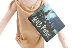 The Noble Collection Dobby plush in a sitting pose for cozy display.