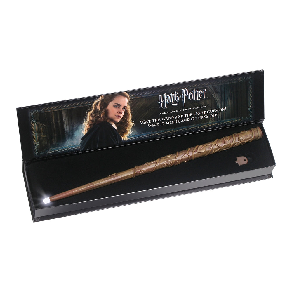 The Noble Collection Hermione Granger Illuminating Wand displayed on a shelf for ambiance