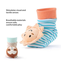 The Peanutshell adjustable rattles fit wrists or ankles for versatile play.