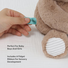 Benny features blue velour accents for extra tactile interest