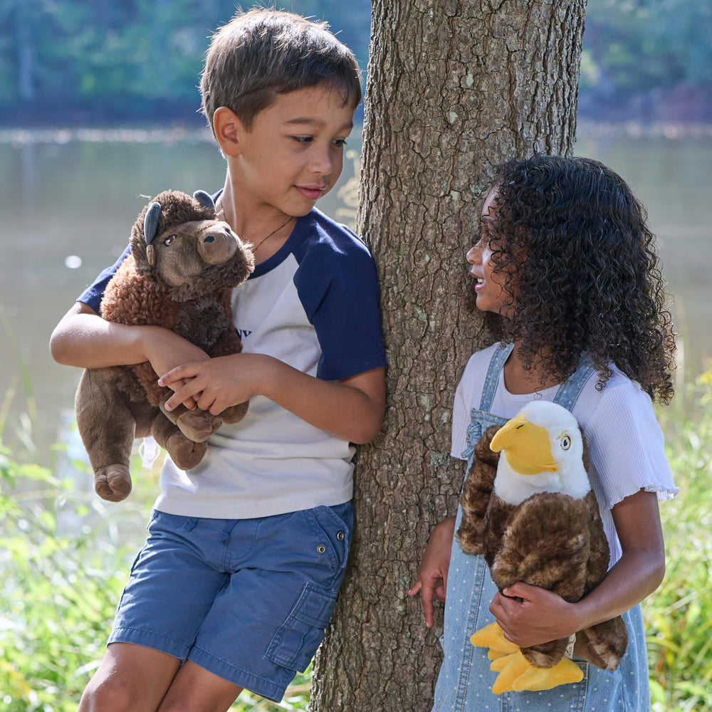The Petting Zoo Bison plush during playtime encourages imaginative Western adventures.