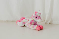 The Petting Zoo pastel tie-dye unicorn 13-inch sitting position for easy display.
