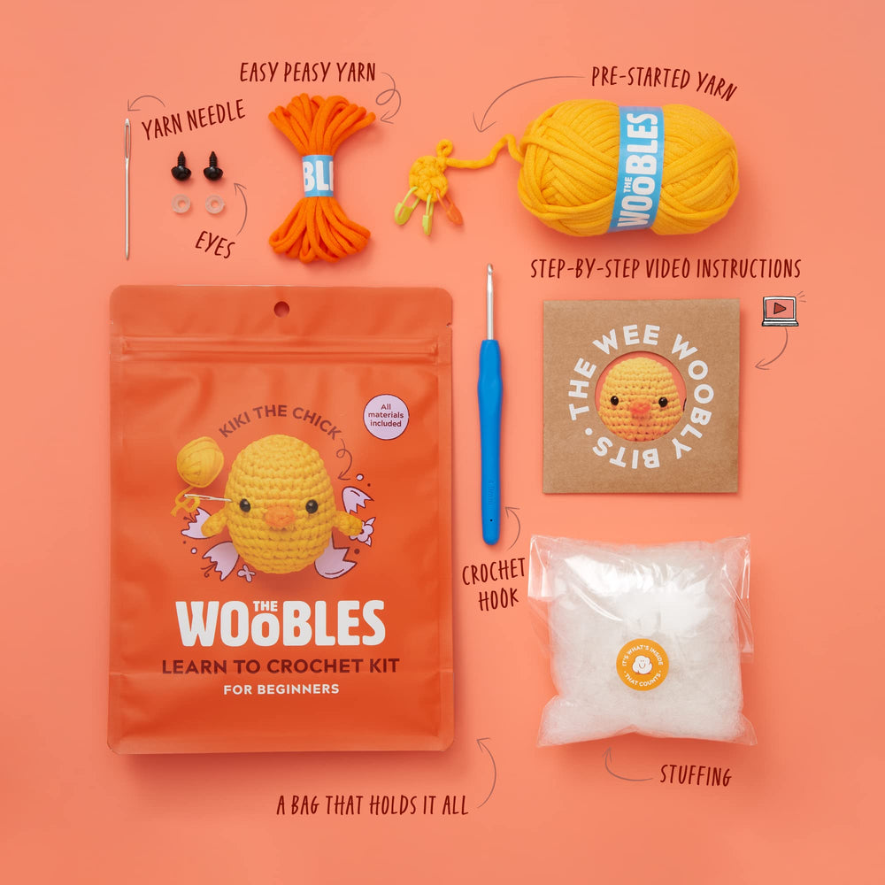 The Woobles Kiki Chick crochet hook and needle for precise stitching.