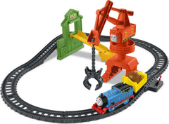 Thomas & Friends dock pieces and barrels create a vivid cargo-landing scene for imaginative play.