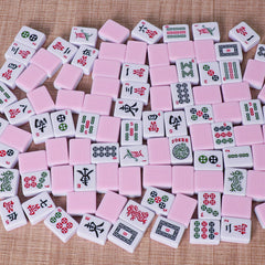 TIASUSAN pink-back tiles arranged for a game session