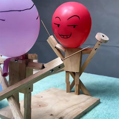 Tictoyo Balloon Head Duel: two players pop and dodge in a fast-paced balloon battle.