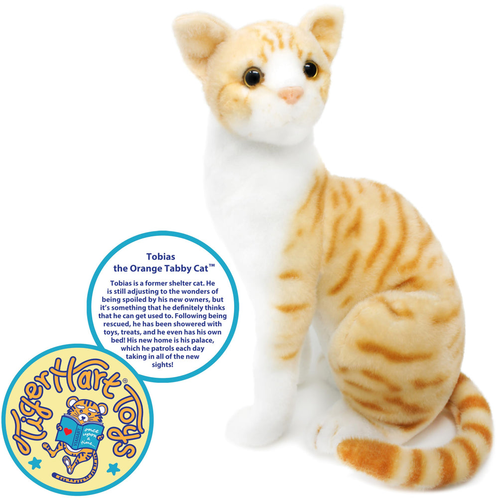 TigerHart Tobias orange tabby plush top view illustrating compact 9 by 6.5 by 12.5 inch size for hugs.