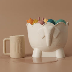 Tiipi Elephant Buddy adds charm while keeping bath toys tidy.