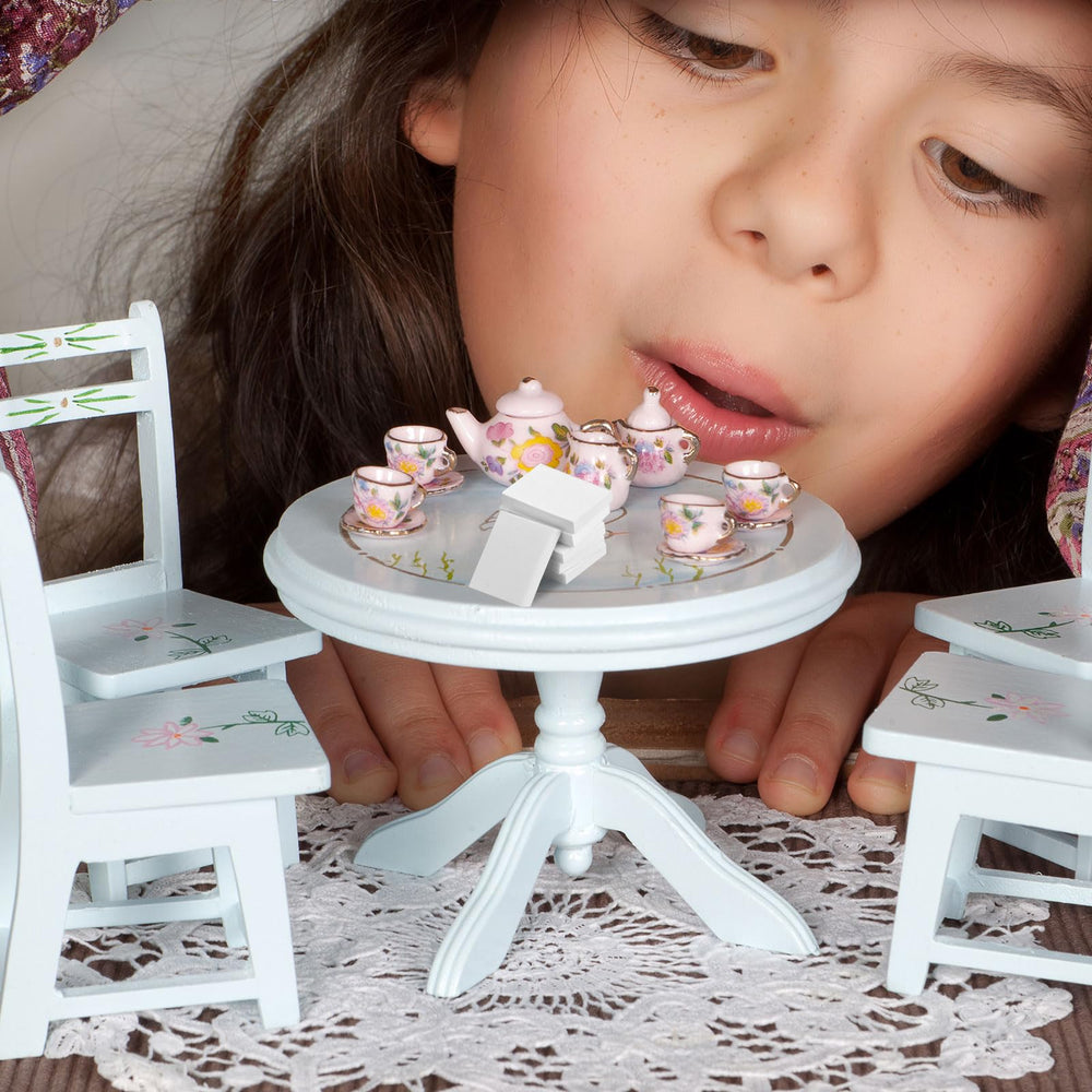 Tinoaly miniature book as a thoughtful dollhouse gift idea.