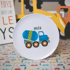 Tiny Expressions dump-truck plate showing cheerful colors and BPA-free safety