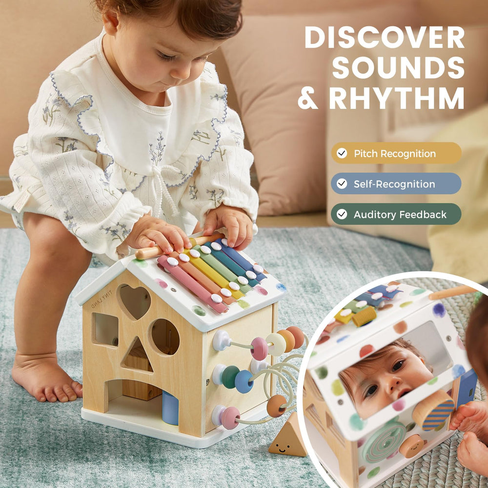 Tiny Land 9-in-1 doors and windows: interactive play for language-rich moments.