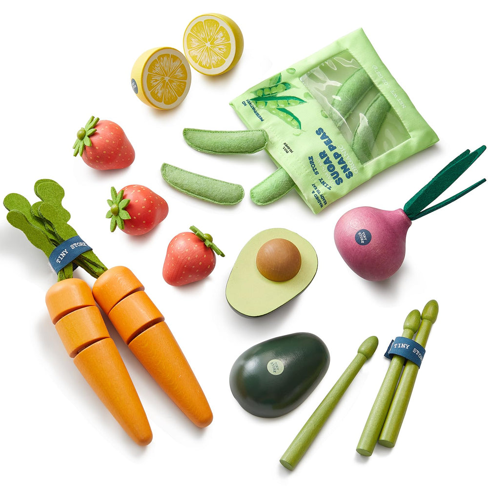 Tiny Land wooden avocado for pretend meals and fine motor play.