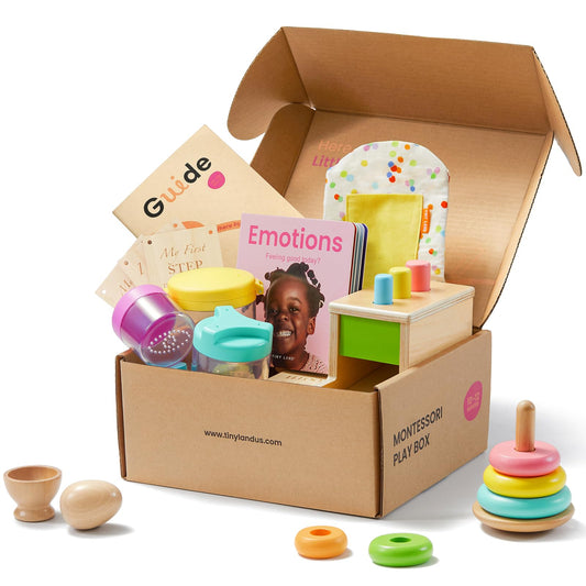 Tiny Land Peg Drop Box promotes fine motor play for babies.