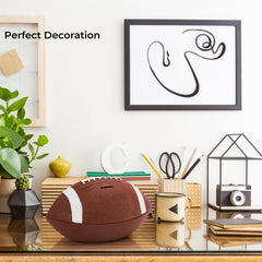 Tlence bank features raised lace details for authentic football look.
