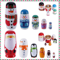 Tngan Christmas nesting dolls display featuring Santa and snowman.