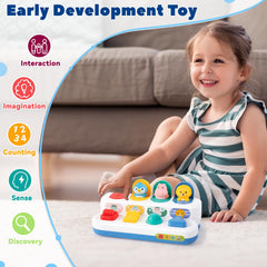 Tovol Zerky toddler hand-pressing a button to activate the pop-up.