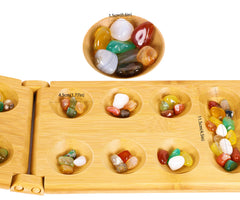 TOWO Mancala board open layout showing 12 pits and 2 stores for classic play
