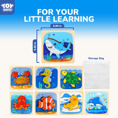 TOY Life puzzle in a toddler's hand, illustrating easy grasp and manipulation.