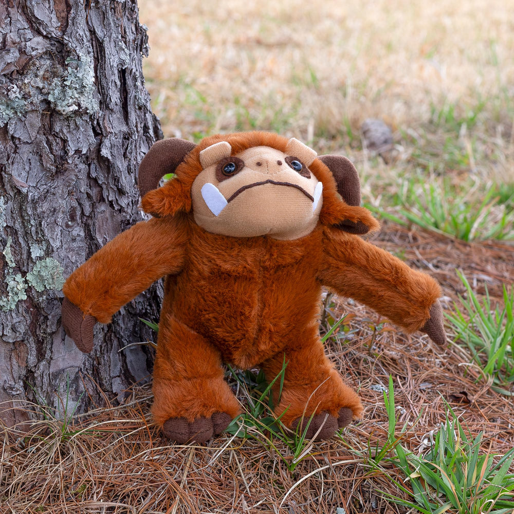 Reddish-brown body with chocolate horns and tan snout for character.