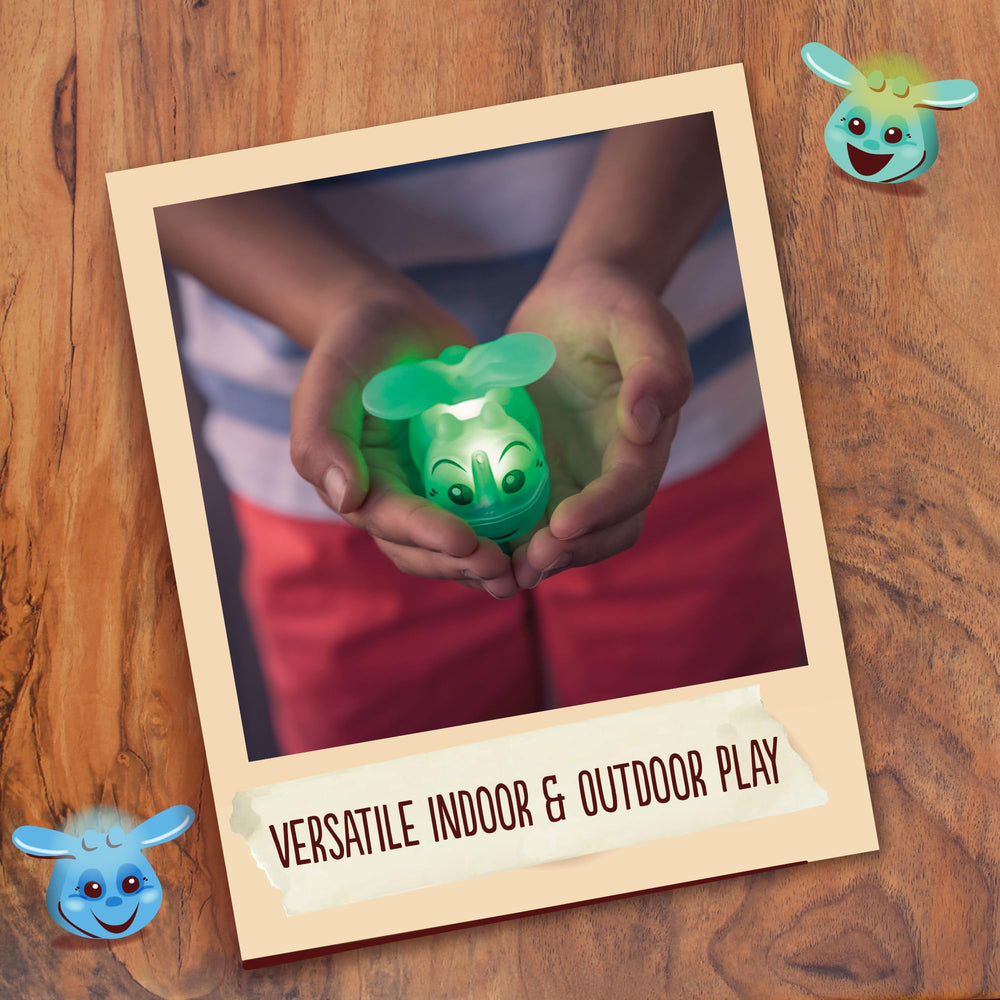 Kids enjoy a backyard night game with Toysmith glow figures.
